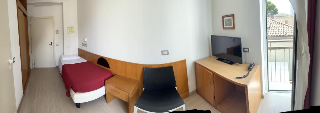 TV a/nebo společenská místnost v ubytování Hotel Morolli