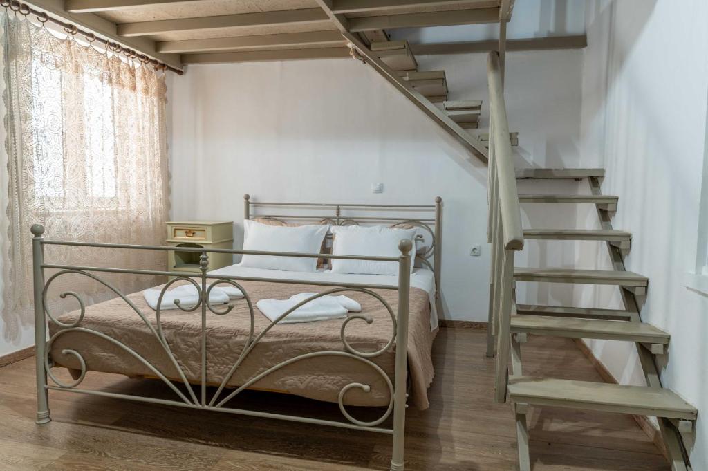 Postel nebo postele na pokoji v ubytování House Rachati