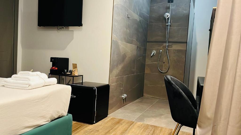 Postel nebo postele na pokoji v ubytování Palazzo Gatto Bianco