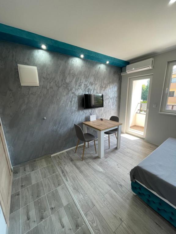 Postel nebo postele na pokoji v ubytování Apartmani borova 2