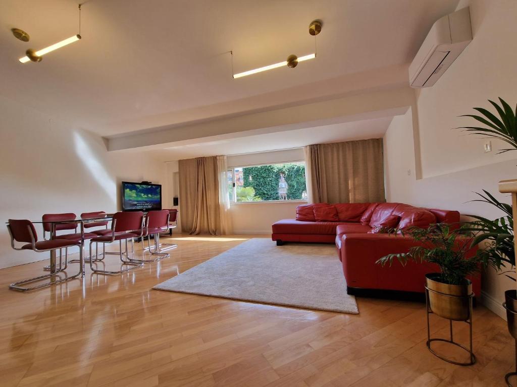 TV a/nebo společenská místnost v ubytování Guest House Laura