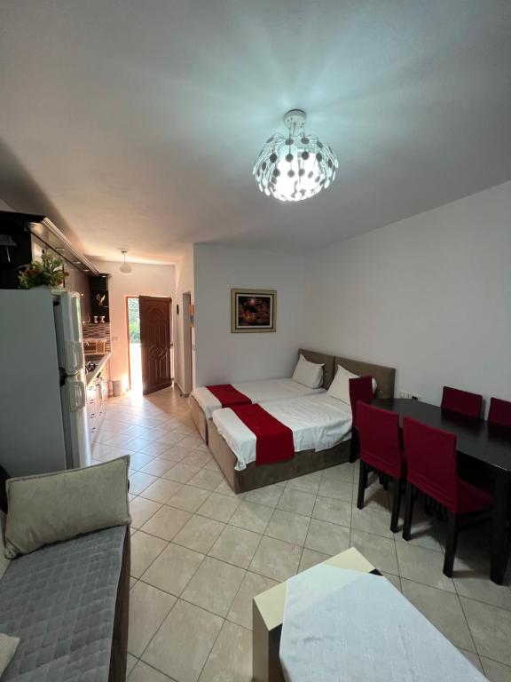 Postel nebo postele na pokoji v ubytování Hotel Gjoci