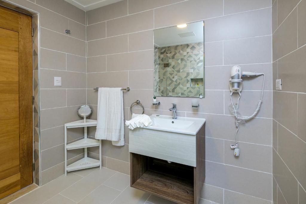 Koupelna v ubytování Amar'e Aparthotel & Spa