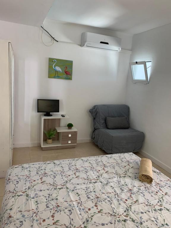 Postel nebo postele na pokoji v ubytování Casa los Pinos Calpe Playa