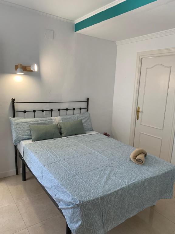 Postel nebo postele na pokoji v ubytování Casa los Pinos Calpe Playa