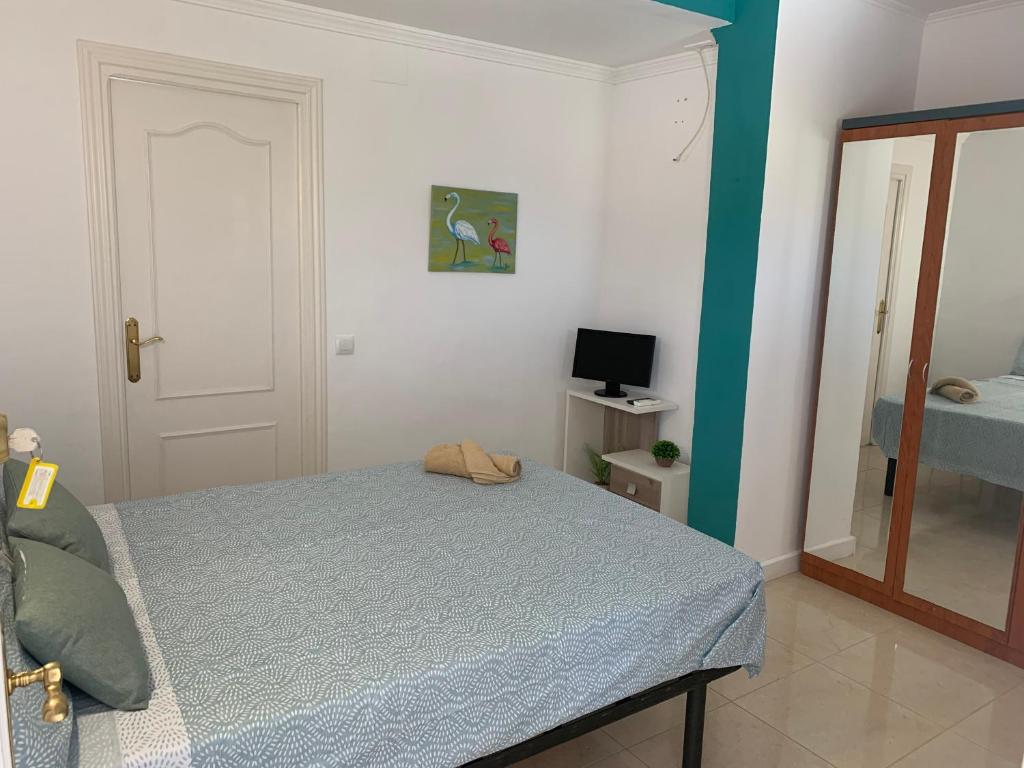 Postel nebo postele na pokoji v ubytování Casa los Pinos Calpe Playa