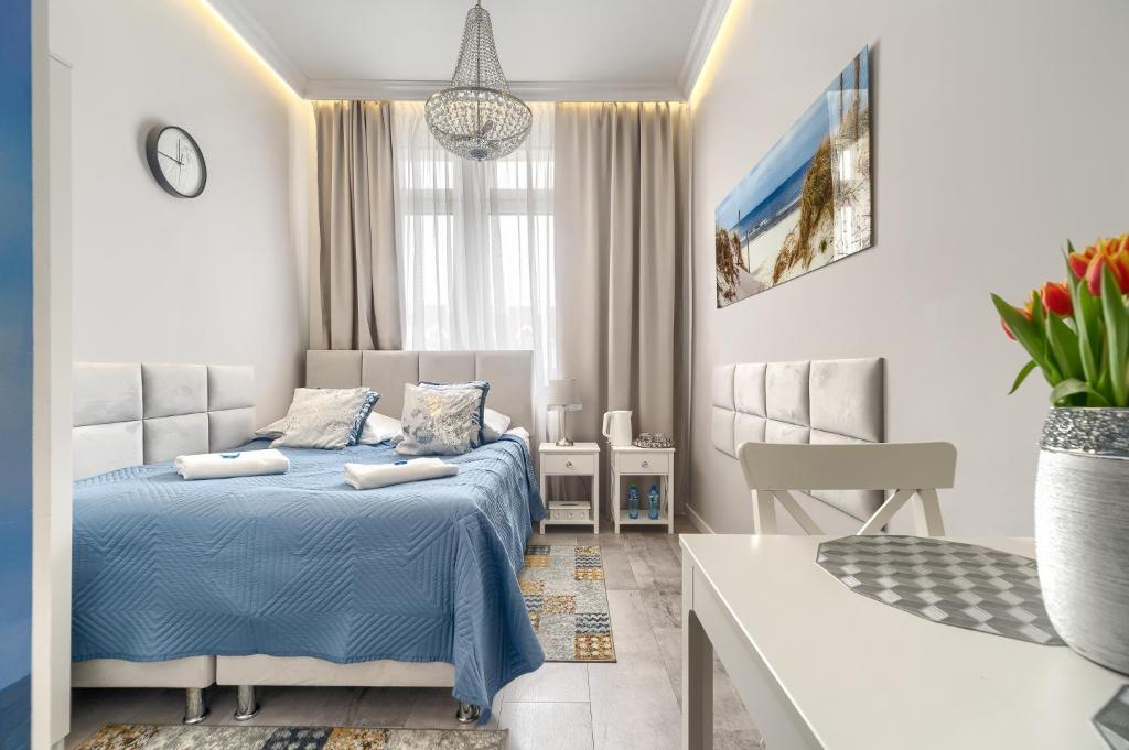 Postel nebo postele na pokoji v ubytování Stawa Villa & Apart