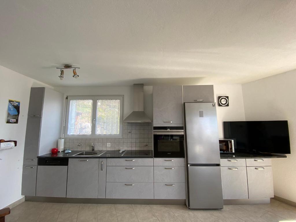 Kuchyň nebo kuchyňský kout v ubytování Dream holiday house with a fantastic view of Lake Maggiore and the pool