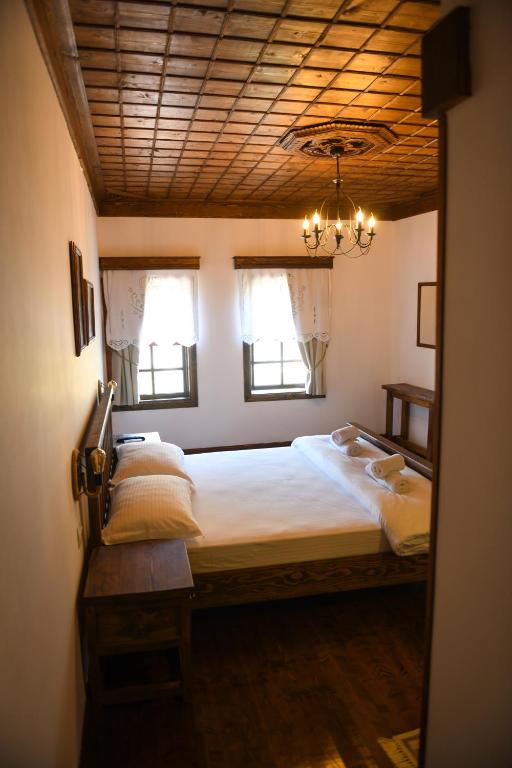 Llit o llits en una habitació de Anhel Hotel