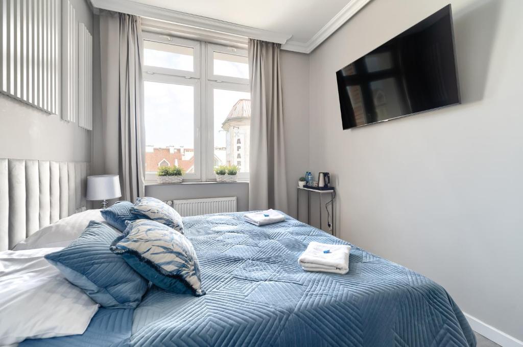 Postel nebo postele na pokoji v ubytování Stawa Villa & Apart