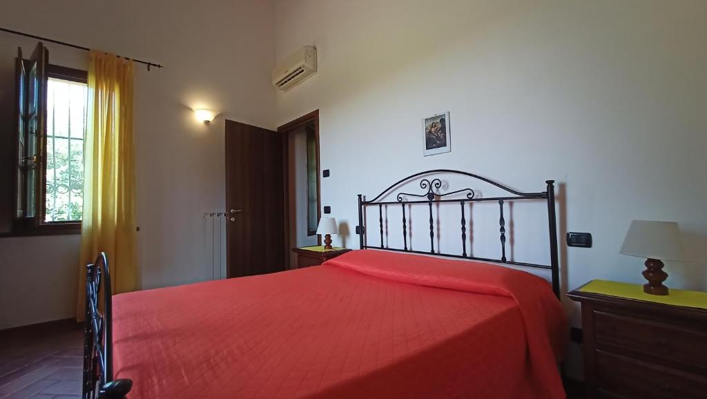 Postel nebo postele na pokoji v ubytování il Chiassetto Agriturismo No Kids