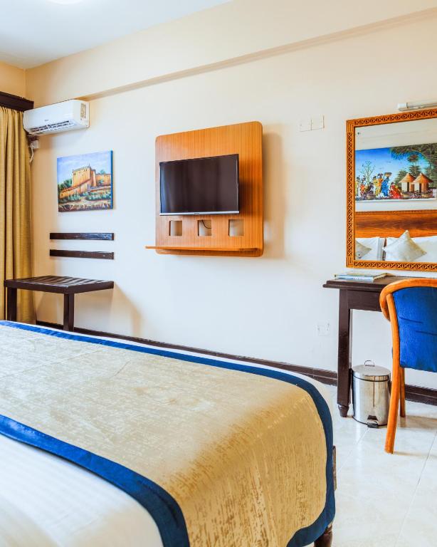 TV a/nebo společenská místnost v ubytování Hotel Sapphire