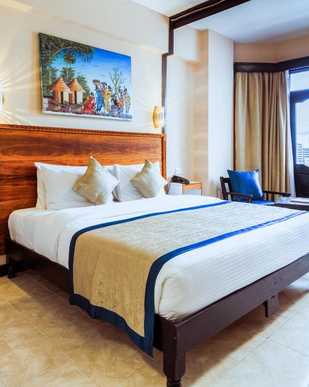 Postel nebo postele na pokoji v ubytování Hotel Sapphire