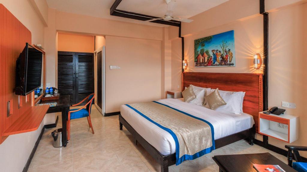 Postel nebo postele na pokoji v ubytování Hotel Sapphire