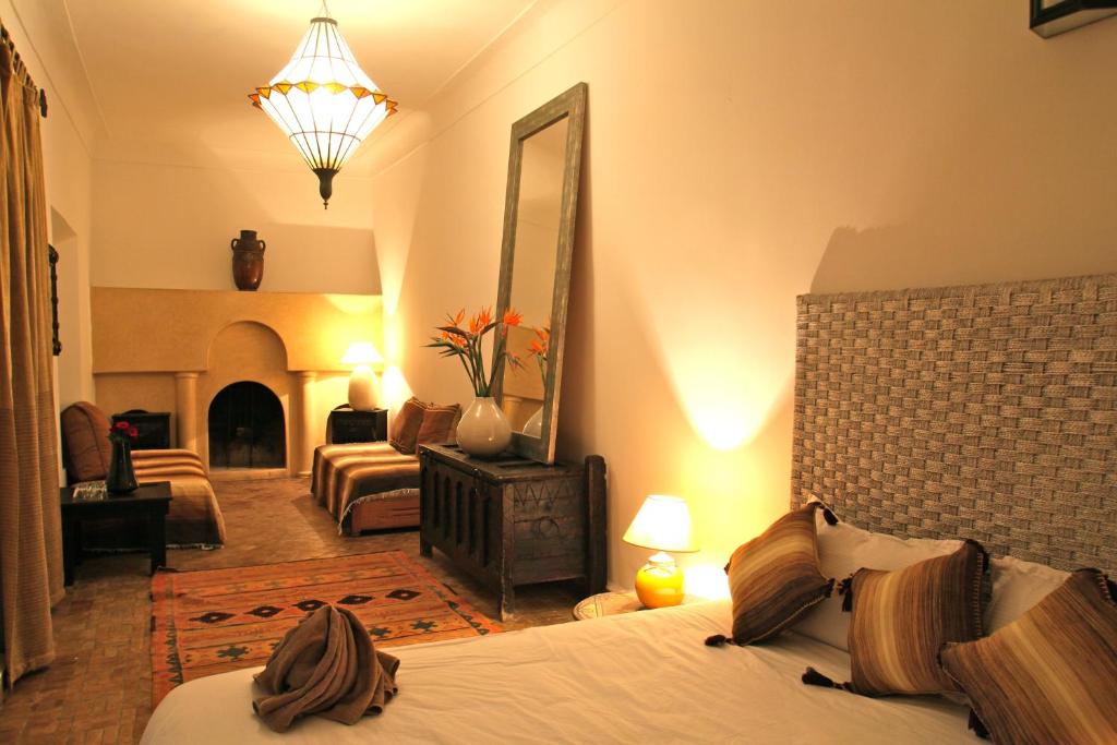 Postel nebo postele na pokoji v ubytování Riad De Vinci & SPA