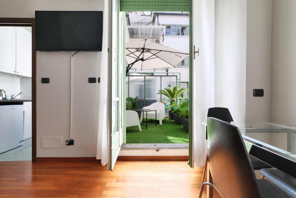 Telewizja i/lub zestaw kina domowego w obiekcie PRESTIGE BOUTIQUE HOMES - Duomo 2