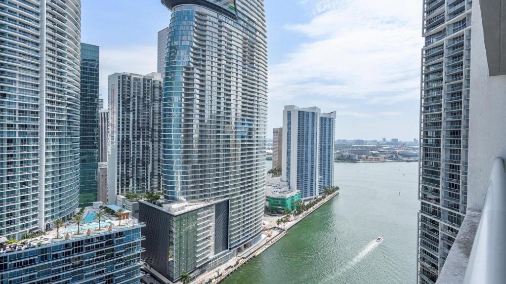 a view of a river in a city with tall buildings at Miami city Views at Icon Brickell in Miami