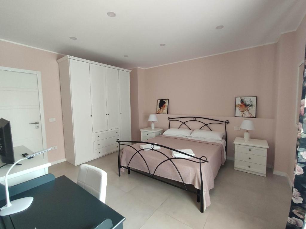 Postel nebo postele na pokoji v ubytování GArt Riviera B&B