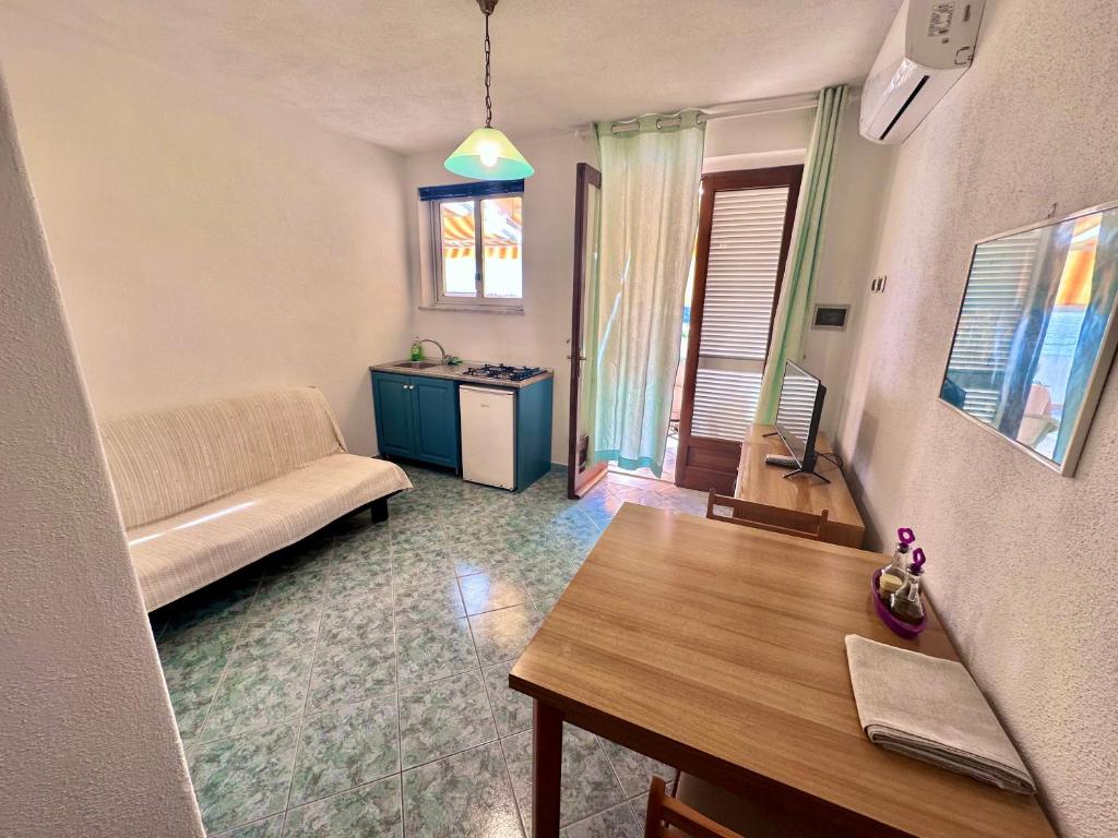 Postel nebo postele na pokoji v ubytování Casa Assunta
