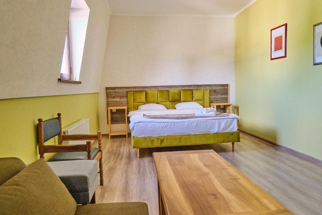 Postel nebo postele na pokoji v ubytování 21 Rooms Hotel