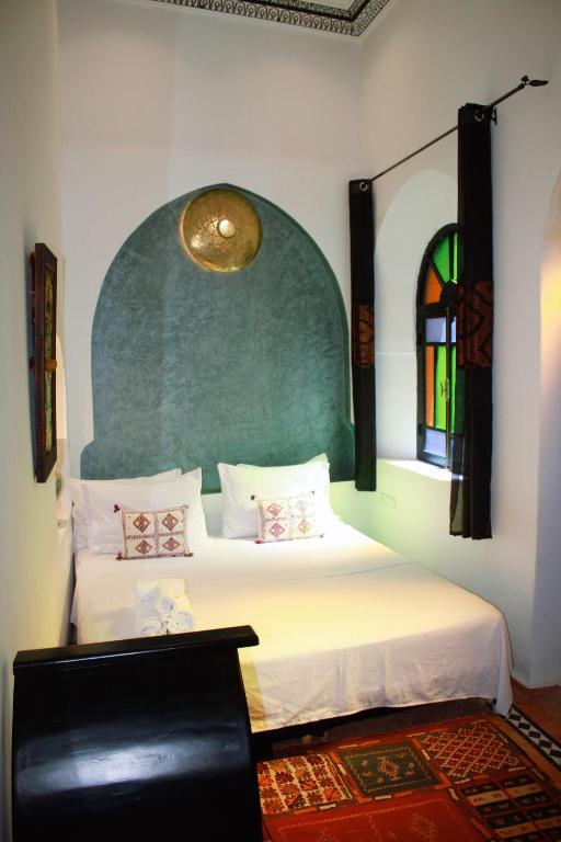 Letto o letti in una camera di Riad Zyna