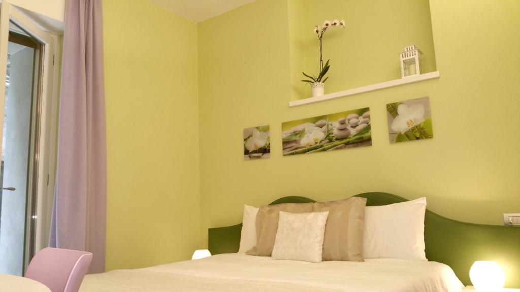Een bed of bedden in een kamer bij Villa Monti