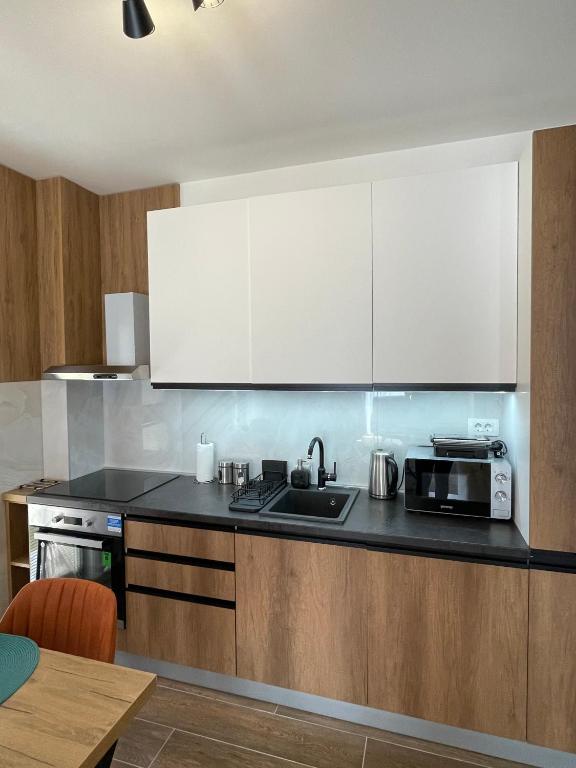Kuchyň nebo kuchyňský kout v ubytování Apartments Gora