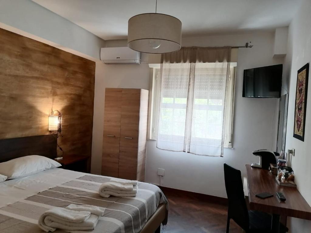 Postel nebo postele na pokoji v ubytování B&B Atlante