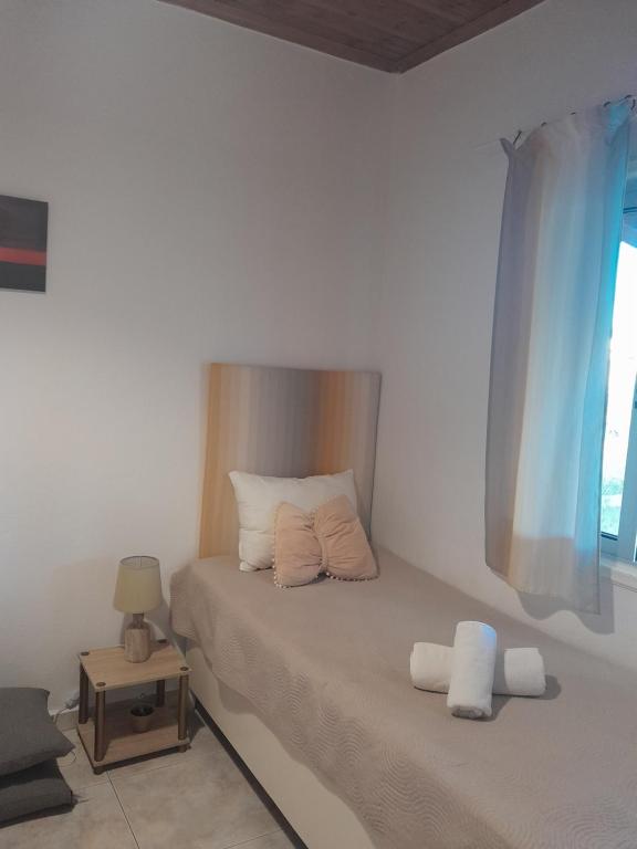 A bed or beds in a room at Gorjelina `s House
