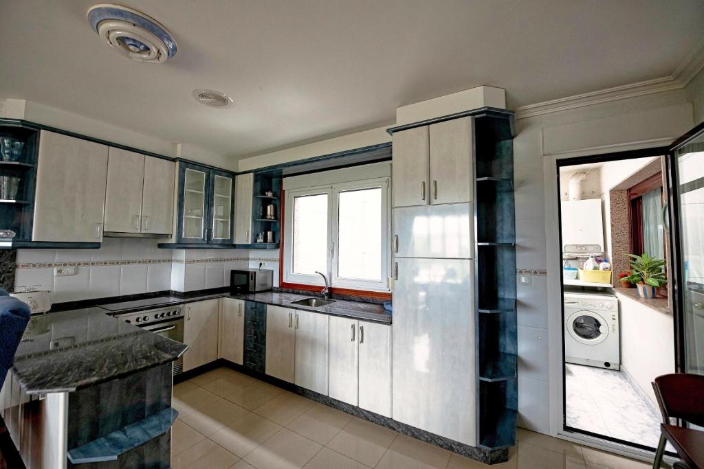 Kuchnia lub aneks kuchenny w obiekcie APARTAMENTO AVELINA