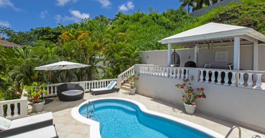 Pemandangan kolam renang di Nevis Villa by Barbados Sotheby's International Realty villa atau di dekatnya