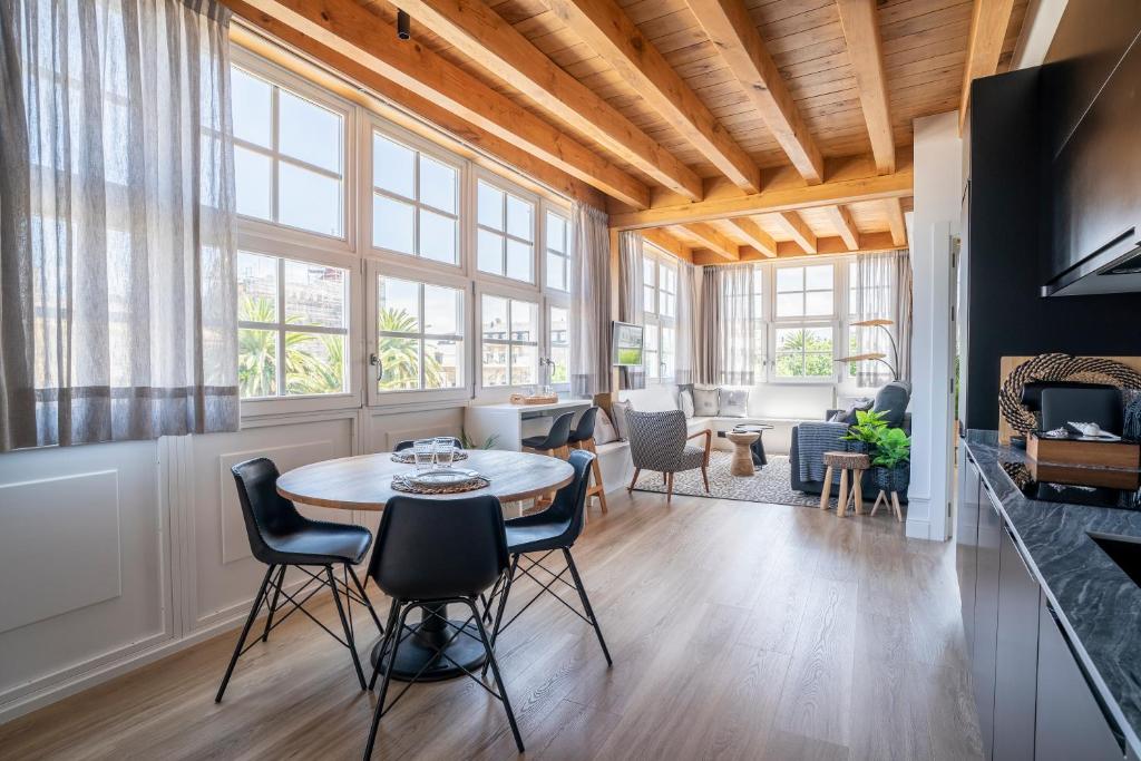 Posedenie v ubytovaní Apartamentos Turísticos Casa Arango