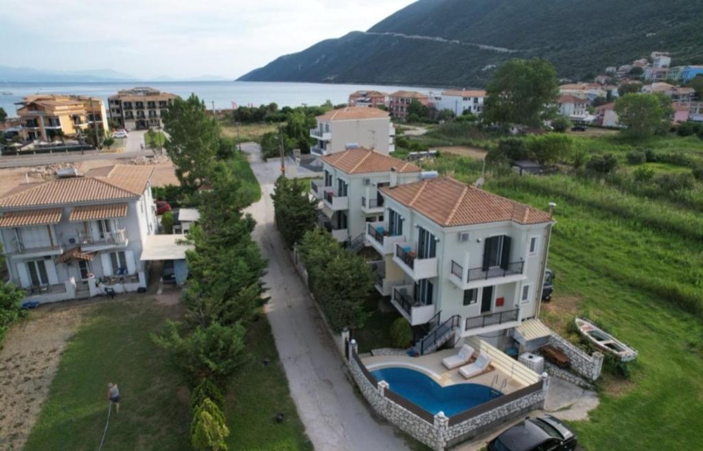 an aerial view of a house with a swimming pool at Santa Emelia in Vasiliki