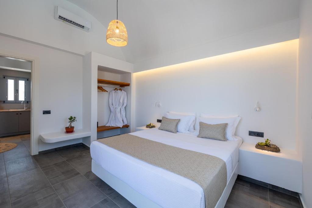 Postel nebo postele na pokoji v ubytování Bonsai Luxury Suites