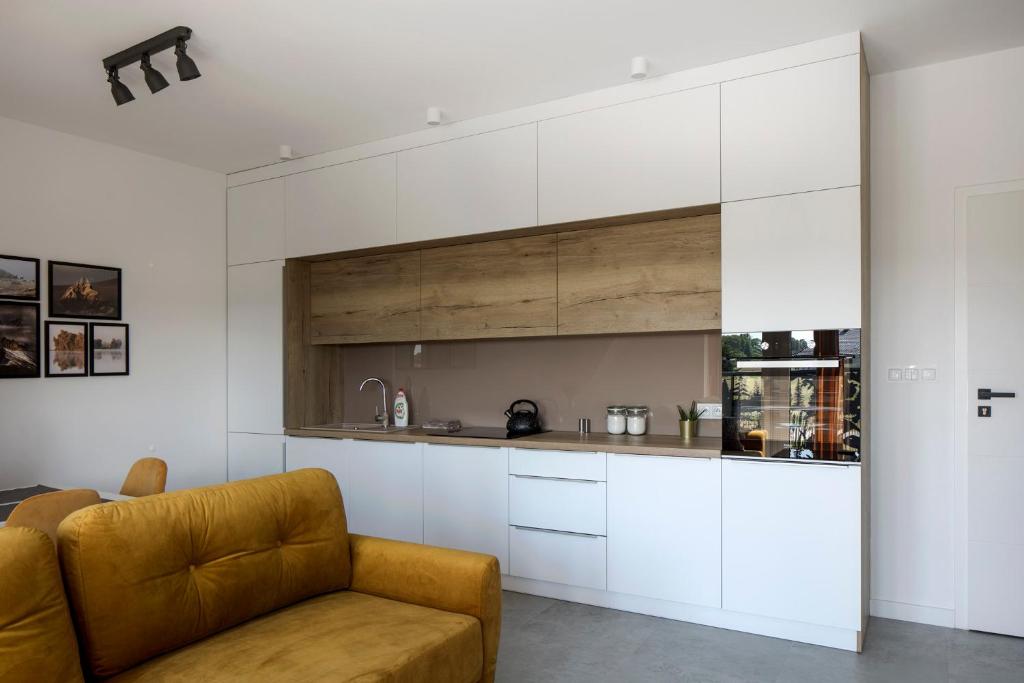 Kuchyň nebo kuchyňský kout v ubytování Apartamenty Zielona Lipka