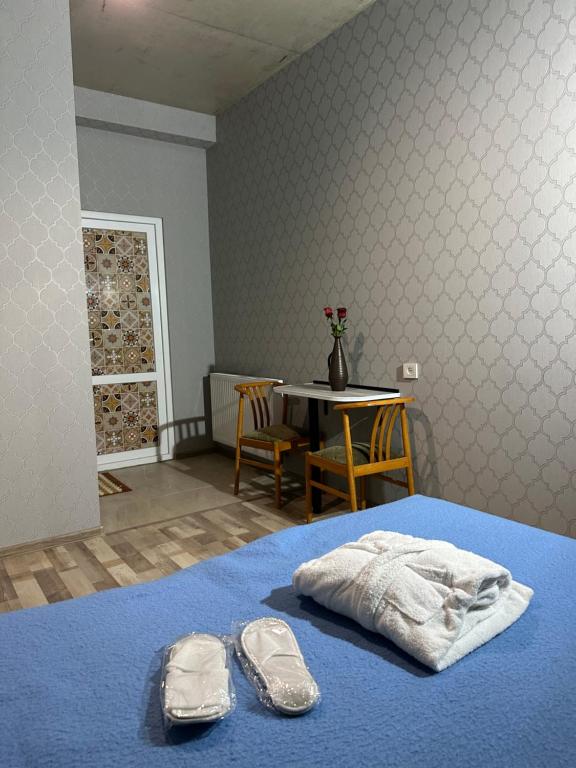Postel nebo postele na pokoji v ubytování Nid Hotel