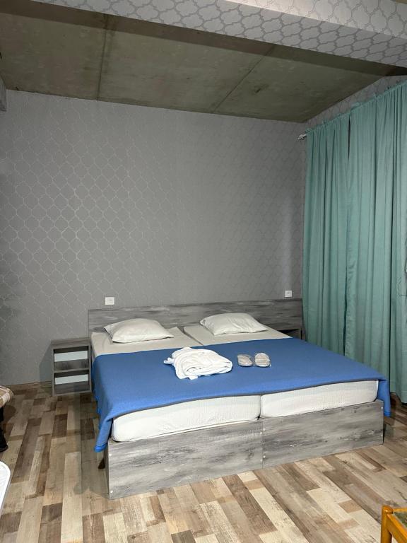 Postel nebo postele na pokoji v ubytování Nid Hotel
