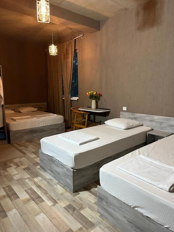 Postel nebo postele na pokoji v ubytování Nid Hotel