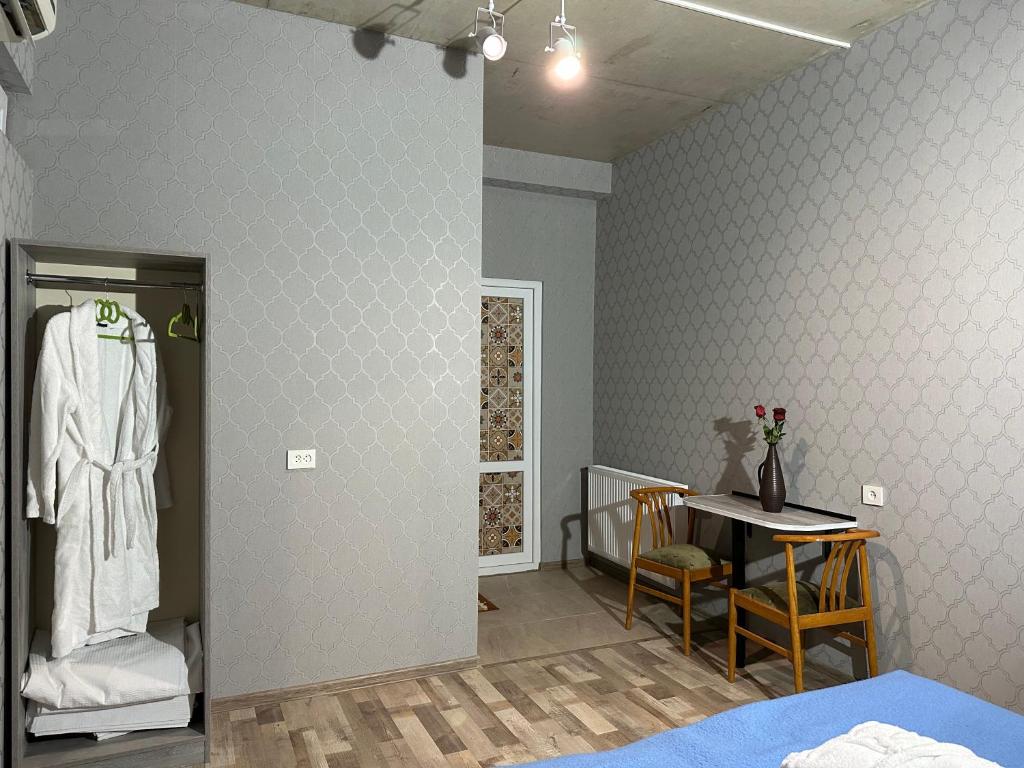 Postel nebo postele na pokoji v ubytování Nid Hotel