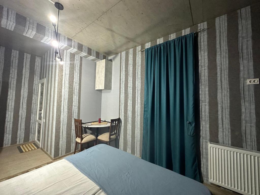 Postel nebo postele na pokoji v ubytování Nid Hotel