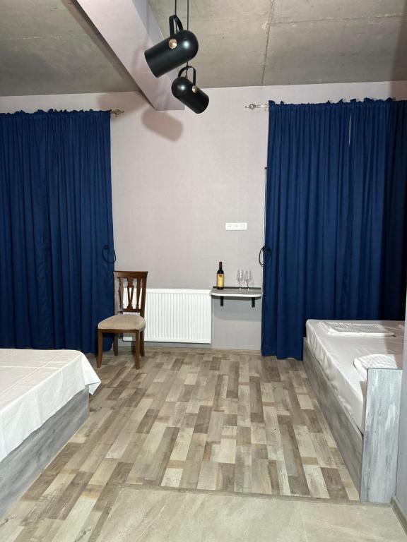 Postel nebo postele na pokoji v ubytování Nid Hotel