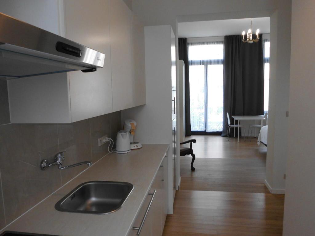 Kuchyň nebo kuchyňský kout v ubytování Aparthotel Midi Residence