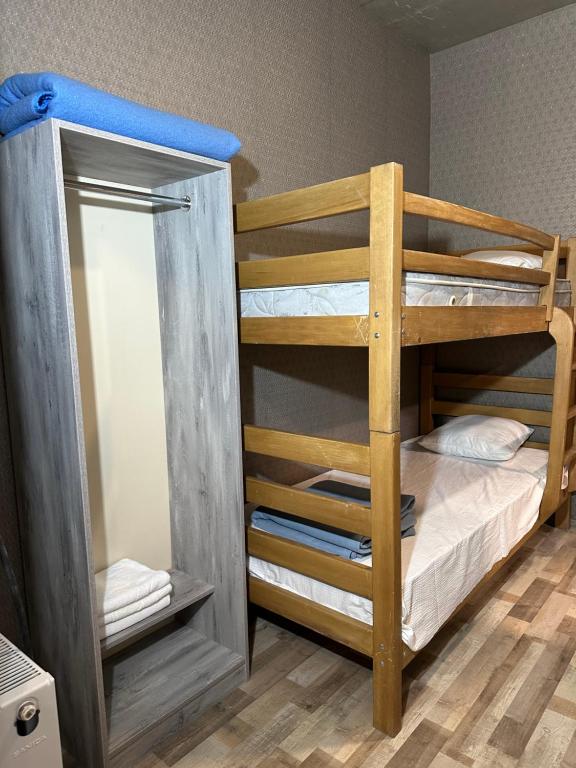 Postel nebo postele na pokoji v ubytování Nid Hotel