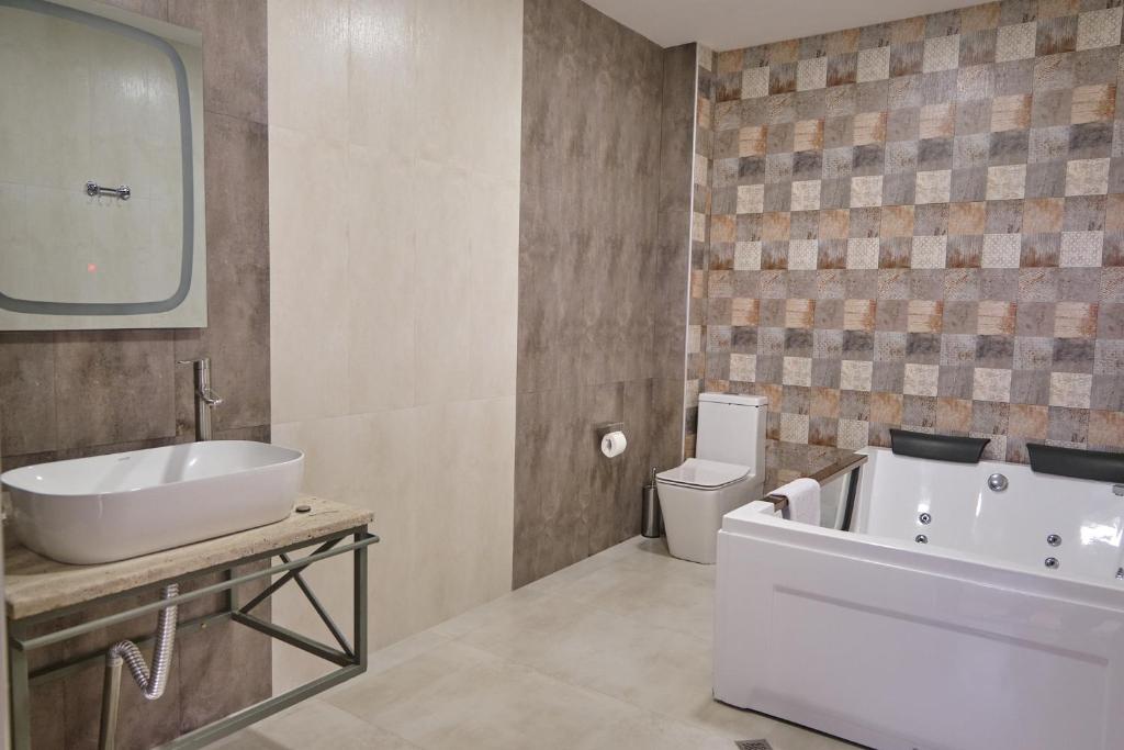 Koupelna v ubytování 21 Rooms Hotel