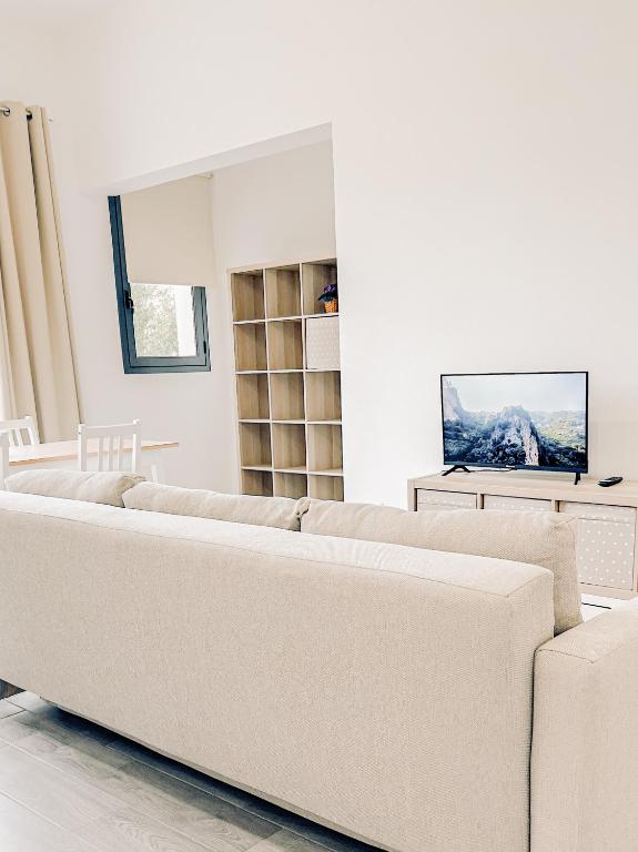 TV a/nebo společenská místnost v ubytování Zagare & Mare
