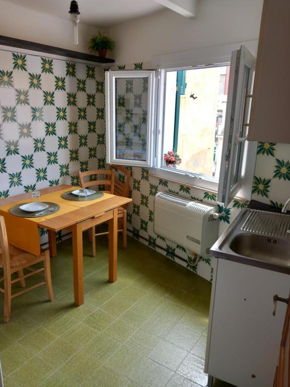 Kuchyň nebo kuchyňský kout v ubytování Da Isabella