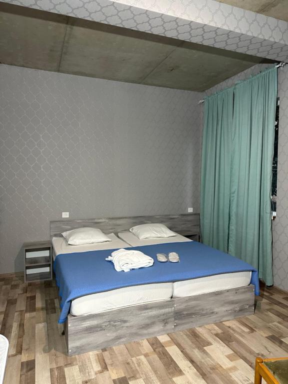 Postel nebo postele na pokoji v ubytování Nid Hotel