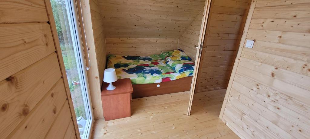 Postel nebo postele na pokoji v ubytování Drewniak