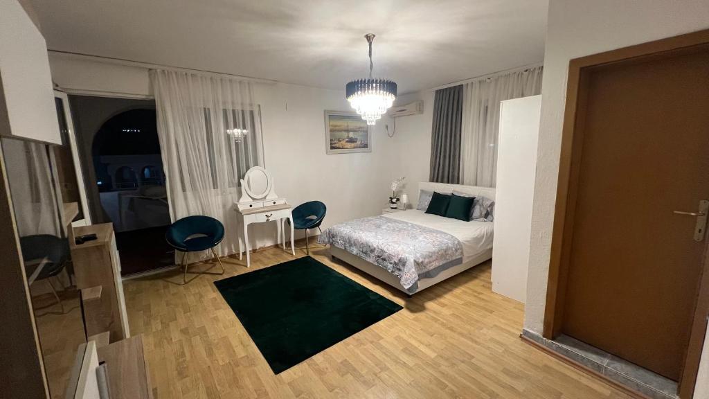 Postel nebo postele na pokoji v ubytování Apartments Dibra
