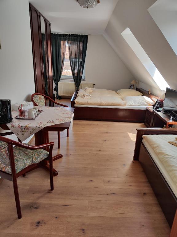 Postel nebo postele na pokoji v ubytování Pension Weidengrund
